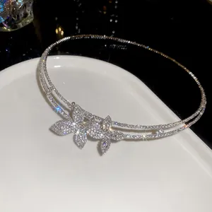 Macro view of a luxury double-layer necklace encrusted with sparkling rhinestones