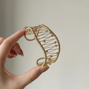 Elegant gold hollow-out wire-wrapped open cuff bracelet for women jewelry