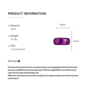 Detail view of purple resin bangle with star patterns and product measurement specifications.