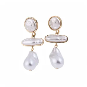Vintage Baroque pearl drop earrings with gold-plated finish on a clean white background