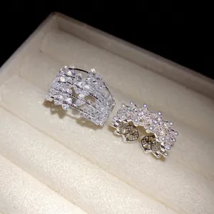 Elegant silver-toned open rings featuring sparkling zircons and delicate white pearls.