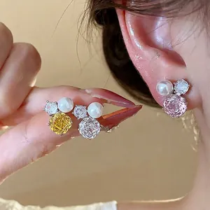 Elegant Korean style earrings with zircon flowers and pearls on silver needles