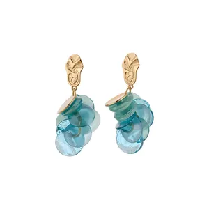 Elegant beachy geometric gold oval stud earrings with blue translucent disc tassels
