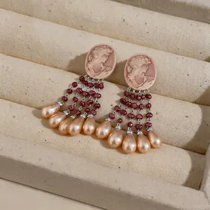 Vintage classical cameo tassel earrings featuring dark red beads and champagne teardrop pearls