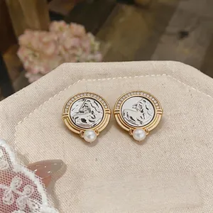 Elegant vintage style circular horse head stud earrings with zircon and white pearl
