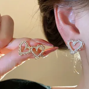 Exquisite 18k gold plated silver needle heart stud earrings with sparkling zircon accents