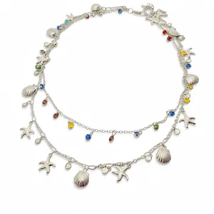 Collier double couche argenté avec strass colorés, breloques en forme d'étoile de mer et coquille