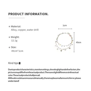 Vue détaillée montrant les dimensions et matériaux du collier double rang avec coquillages.