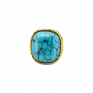 Vintage gold-framed ring featuring a square turquoise stone with black vein details.