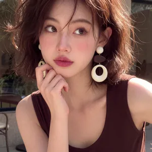 Elegant French vintage wooden earrings with acrylic hollow round pendant for women.