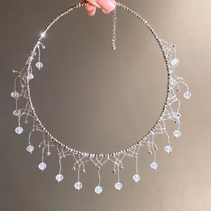 Detailed view of an elegant lace round fringe choker with sparkling crystal pendants.
