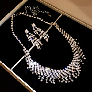 Exquisite sparkling rhinestone tassel necklace and earrings set in jewelry box detail