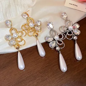 Elegant 18k gold plated floral pearl earrings with sparkling rhinestones and teardrop dangles