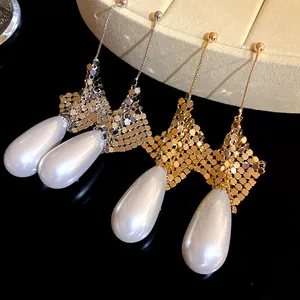 Elegant teardrop pearl dangling earrings with metallic mesh design in gold and silver