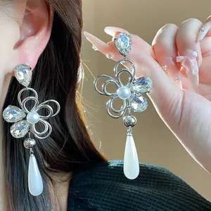 Exquisite flower drop earrings with crystals and white pearls in silver plated finish