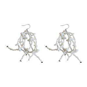 Elegant white shell tassel drop earrings with beaded design for summer vacation.