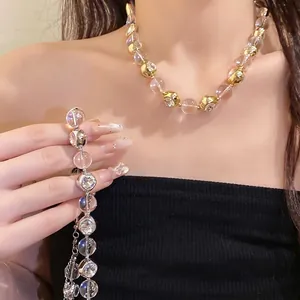Elegant beaded necklace with crystal-clear and rhinestone-inlaid metallic beads.