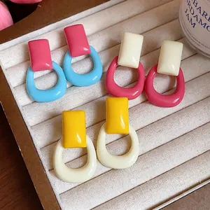 Vibrant dopamine style resin geometric stud earrings in a colorful palette for women.