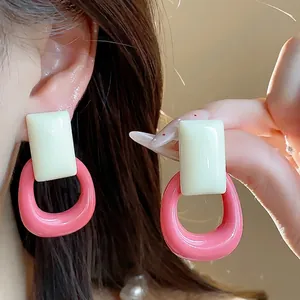 Chic pink and cream resin geometric stud earrings with silver needles for women