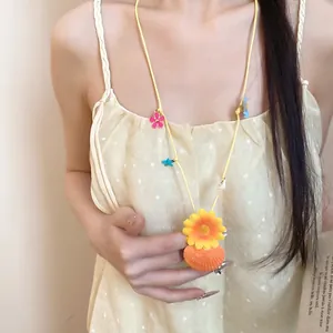 Floral shell necklace with starfish accents for beach vacation style
