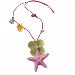 Sunset bay starfish and flower pendant necklace with pink cord for summer beach vacation