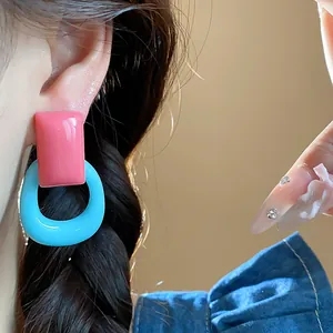 Fashionable dopamine style geometric resin drop earrings in vibrant pink and blue colors