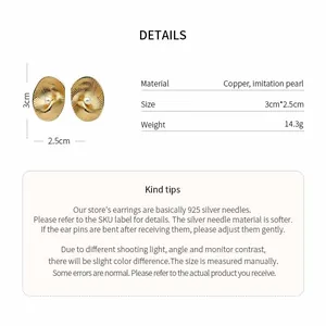 Detailed macro view and specifications of 18k gold plated oval textured pearl earrings