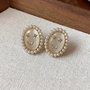 14k gold plated cat eye stone smiley face earrings with pearls and zircon studs