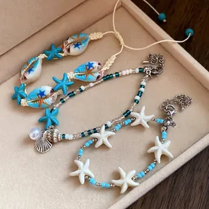 Stylish beach vacation bohemian shell and starfish bracelets in a jewelry box