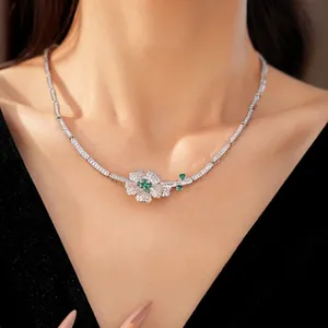 Elegant silver necklace with green zircon flower pendant for women in vintage style