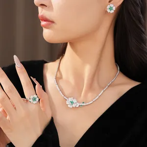 Elegant green zircon flower jewelry set including necklace, ring and earrings