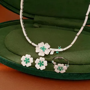 Exquisite green zircon flower jewelry set with necklace, earrings, and ring detail