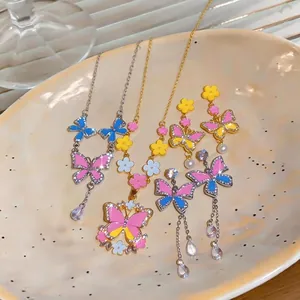 Exquisite enamel butterfly pendant necklaces and drop earrings set in vibrant colors