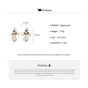 French vintage 18k gold plated petal pearl earrings showing size and material details