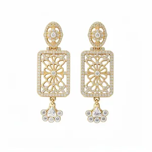 Vintage gold palace style square drop earrings with sparkling diamond-like stones.