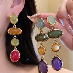 Vintage multi-color resin oval pendant earrings featuring a minimalist light luxury design