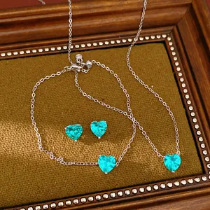 Detailed shot of turquoise heart-shaped zircon necklace bracelet earrings set