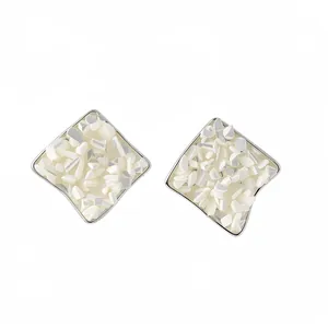 Silver geometric rhombus stud earrings with crushed mother of pearl inlay detail