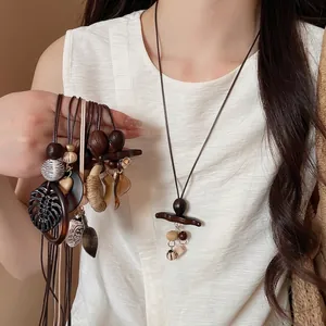 Bohemian vintage heart necklace with wooden beads and leaf charms for women's fashion