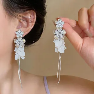 Elegant silver needle long tassel earrings with zirconia flowers and white resin petals