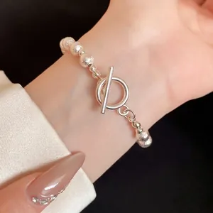Elegant silver frosted bead bracelet with minimalist T-bar toggle clasp for women