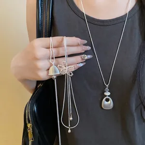 Elegant hollow flower zircon adjustable necklace in silver finish worn by an Asian model