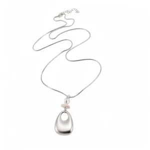Elegant silver-tone long sweater necklace featuring a minimalist hollow pendant with zircon
