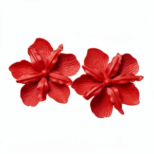Oversized matte red flower stud earrings with elegant sculptural petals for summer vacation