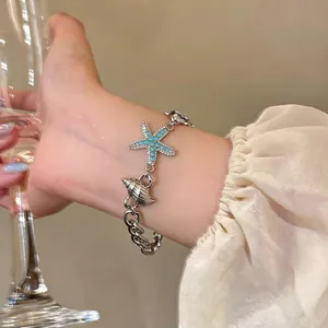Elegante bracciale a catena con ciondoli a stella marina e conchiglia per il mare