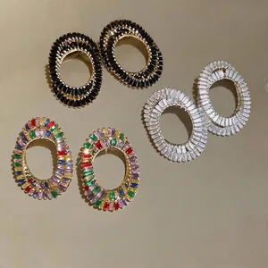 Elegant oval hollow zircon stud earrings set in black, white, and multicolor