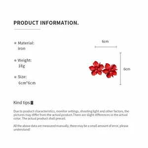 Close-up detail of red flower stud earrings with 6cm size and material specifications