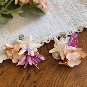 Seaside vacation shell and starfish hair clips with elegant pearl floral decoration