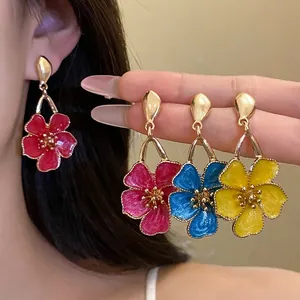 Exquisite retro enamel flower pendant earrings for women in red, blue, and yellow hues
