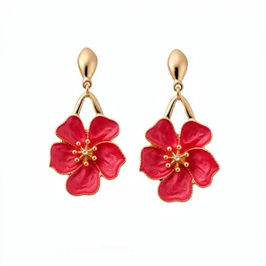 Vintage red hibiscus dangle earrings with gold-tone finish and elegant crystal center